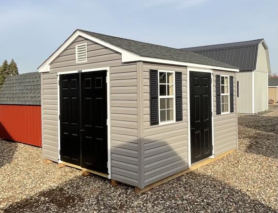 10x12 Vinyl Sided Peak Style Storage Shed by Pine Creek Structures of Berlin