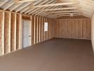 14x36 Peak Style One-Car Garage with a diamond tread plate at the entry way From Pine Creek Structures